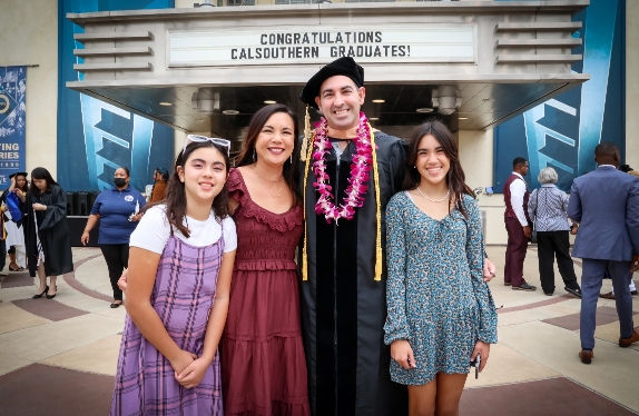 CalSouthern graduate with family